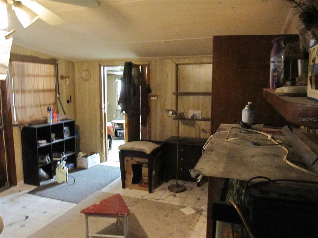 37736 Phelps Road Zephyrhills, FL 33541 - Photo 21 of 30 a workspace with furniture and window