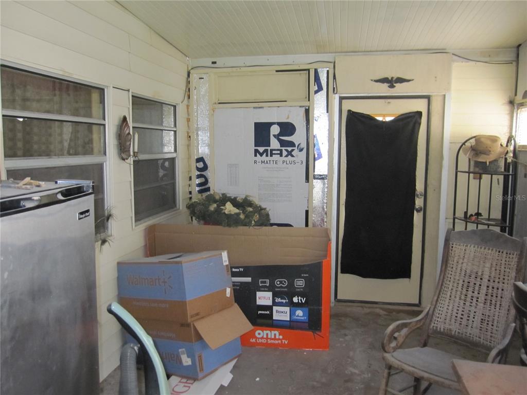 37736 Phelps Road Zephyrhills, FL 33541 - Photo 25 of 30 a living room with furniture and a window