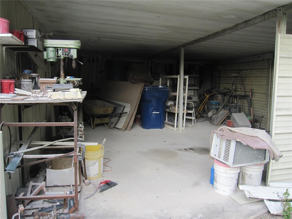 37736 Phelps Road Zephyrhills, FL 33541 - Photo 26 of 30 a view of storage and utility room