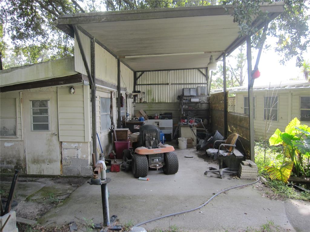37736 Phelps Road Zephyrhills, FL 33541 - Photo 6 of 30 a room with patio