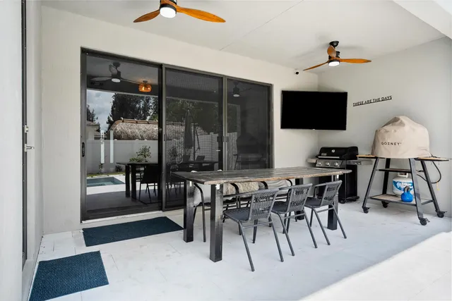 a view of a dining room with furniture