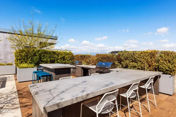 a view of a terrace with furniture