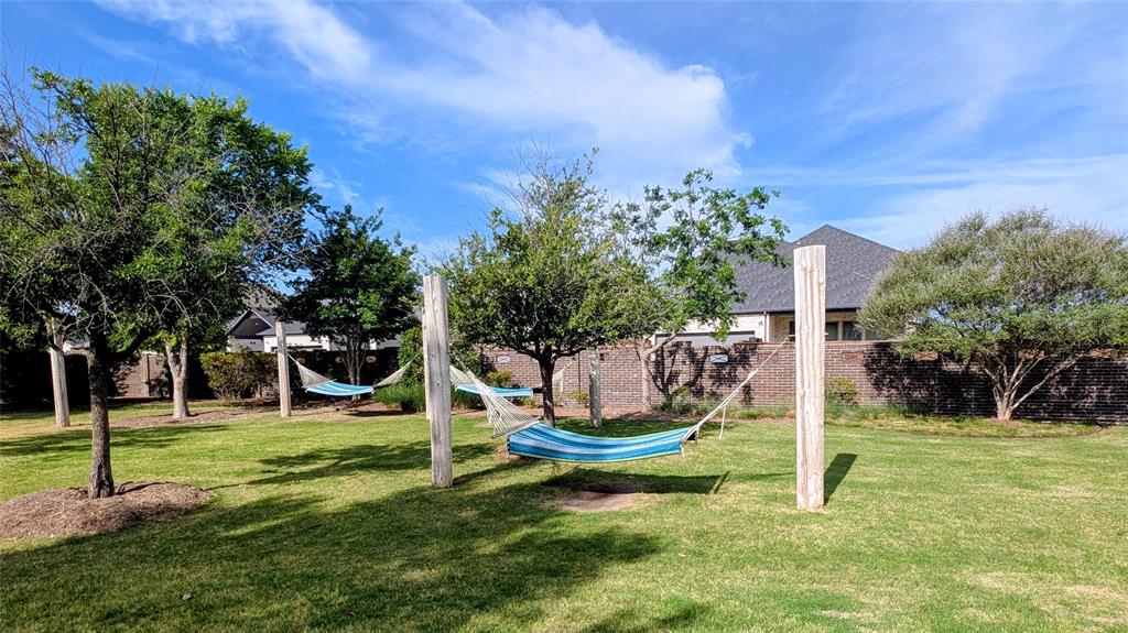 8933 Frostweed Road Frisco, TX 75035 - Photo 27 of 36 a garden view with a sitting space