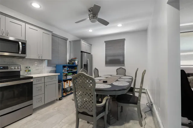 a view of a dining room with furniture