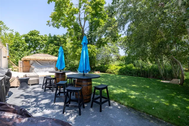a view of a table and chairs in roof deck