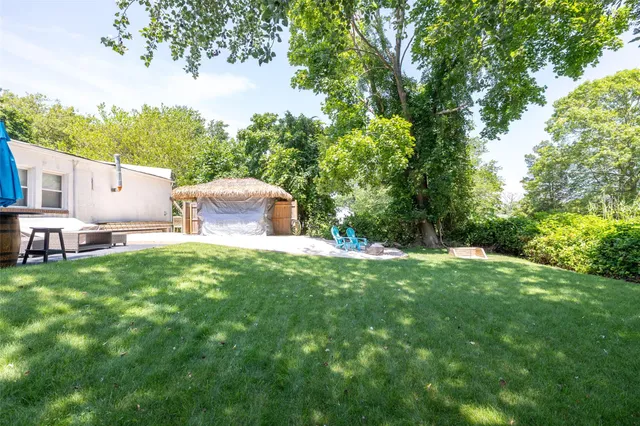 a view of a garden with a bench