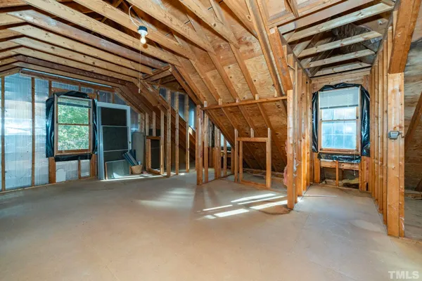 a view of an empty room with a balcony