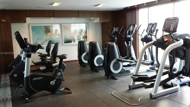 a view of a room with gym equipment
