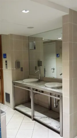 a view of a kitchen with a sink and dishwasher