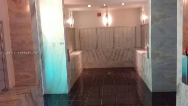 a view of hallway with shower