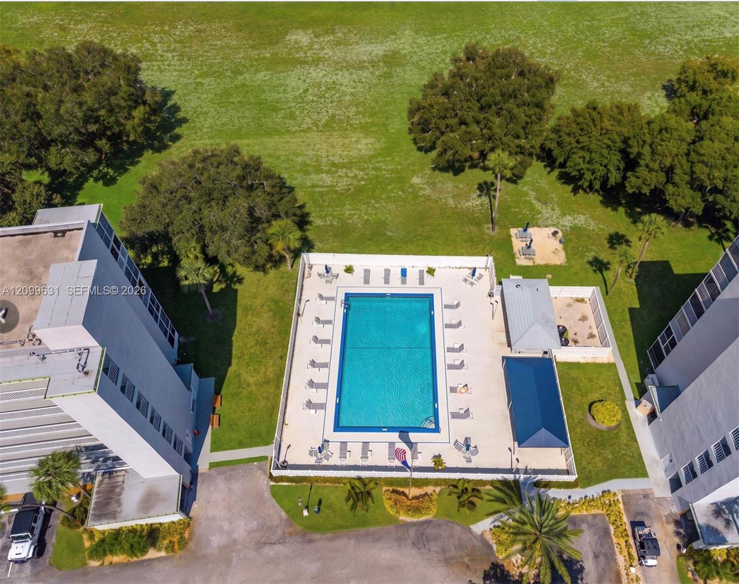 5961 Northwest 2nd Avenue, Unit 612 Boca Raton, FL 33487 - Photo 3 of 11 of olympian sized heated pool