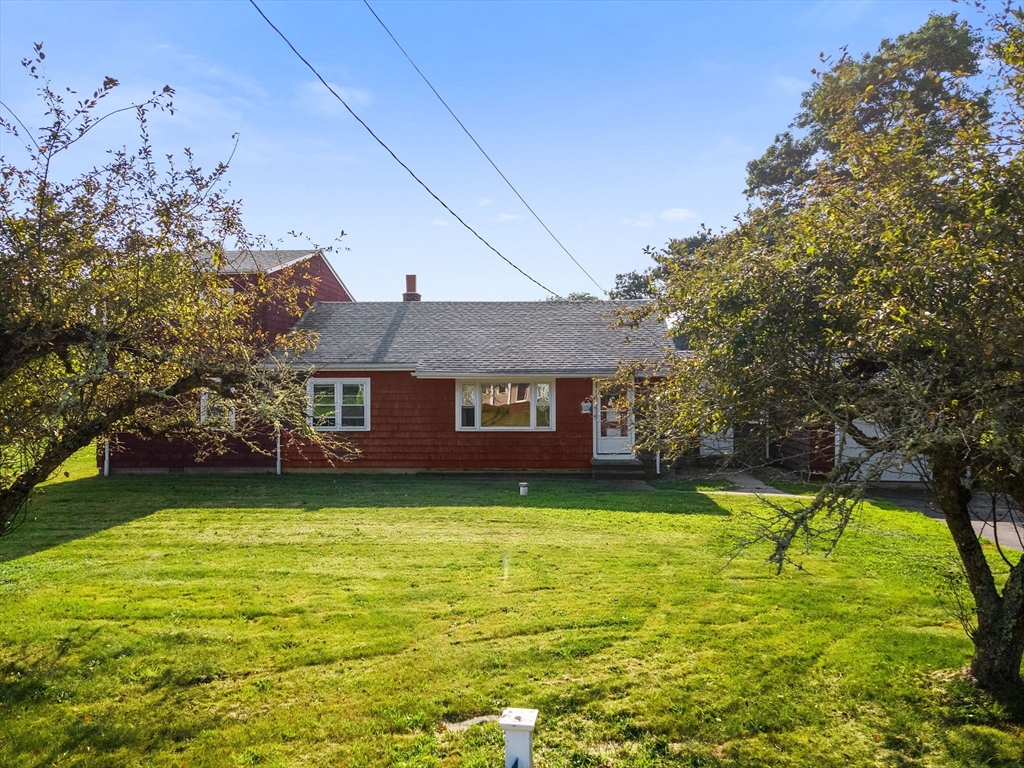 225 Cushman Road Rochester, MA 02770 - Photo 5 of 42 a view of a house with a swimming pool