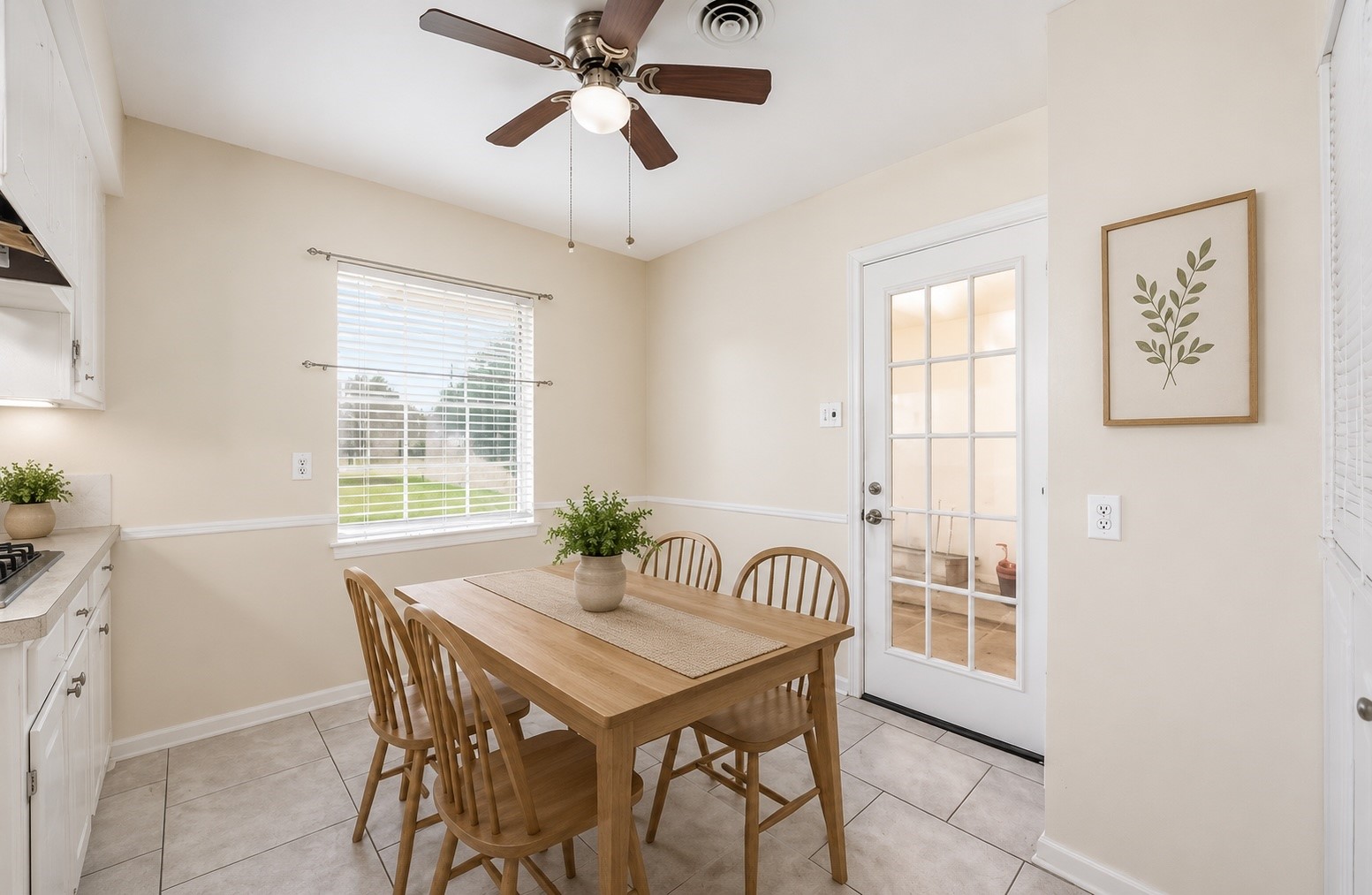 435 Rolling Wood Road Baytown, TX 77520 - Photo 14 of 31 a view of a dining room with furniture and a window