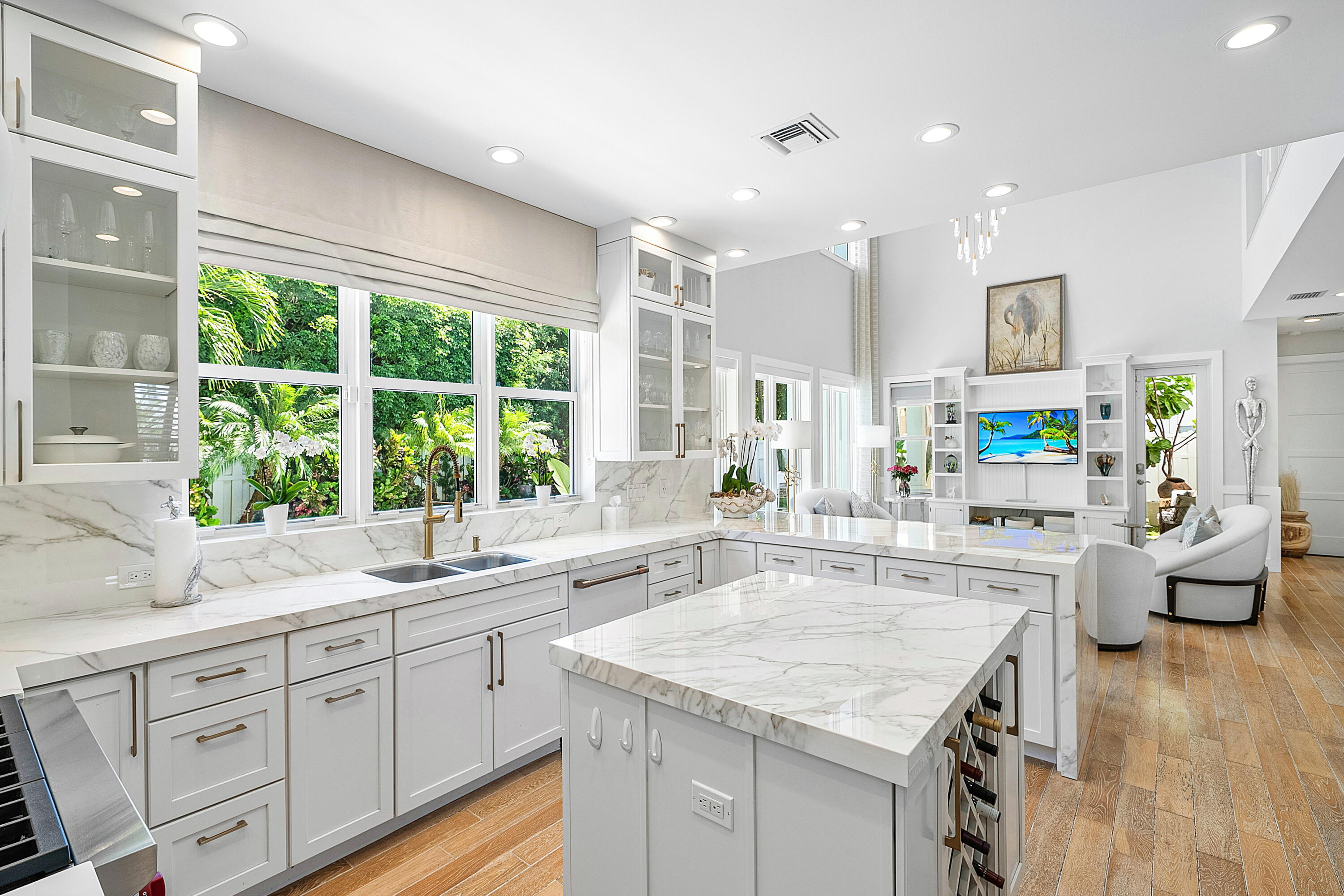 540 Northeast Spanish Trail Boca Raton, FL 33432 - Photo 15 of 47 a kitchen with sink stove and view living room