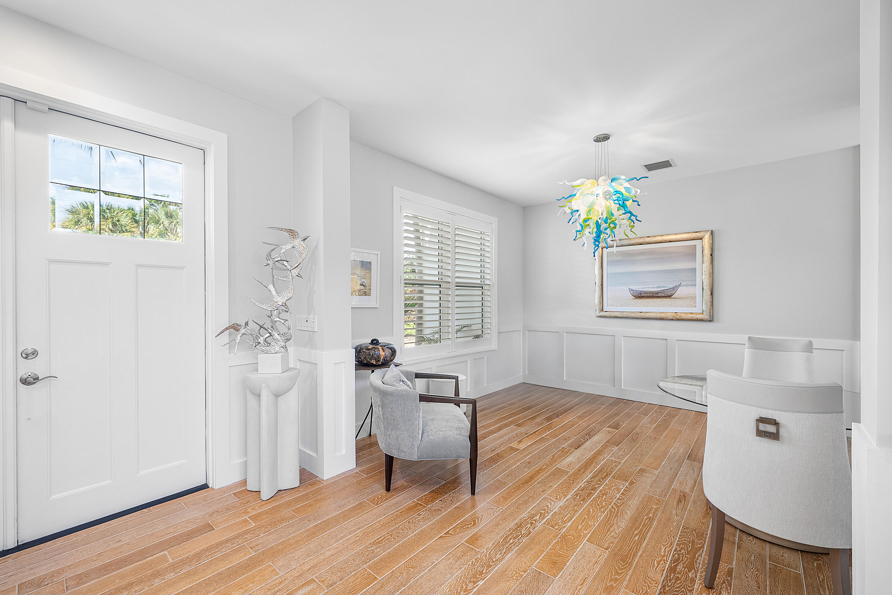 540 Northeast Spanish Trail Boca Raton, FL 33432 - Photo 21 of 47 a living room with furniture and a wooden floor