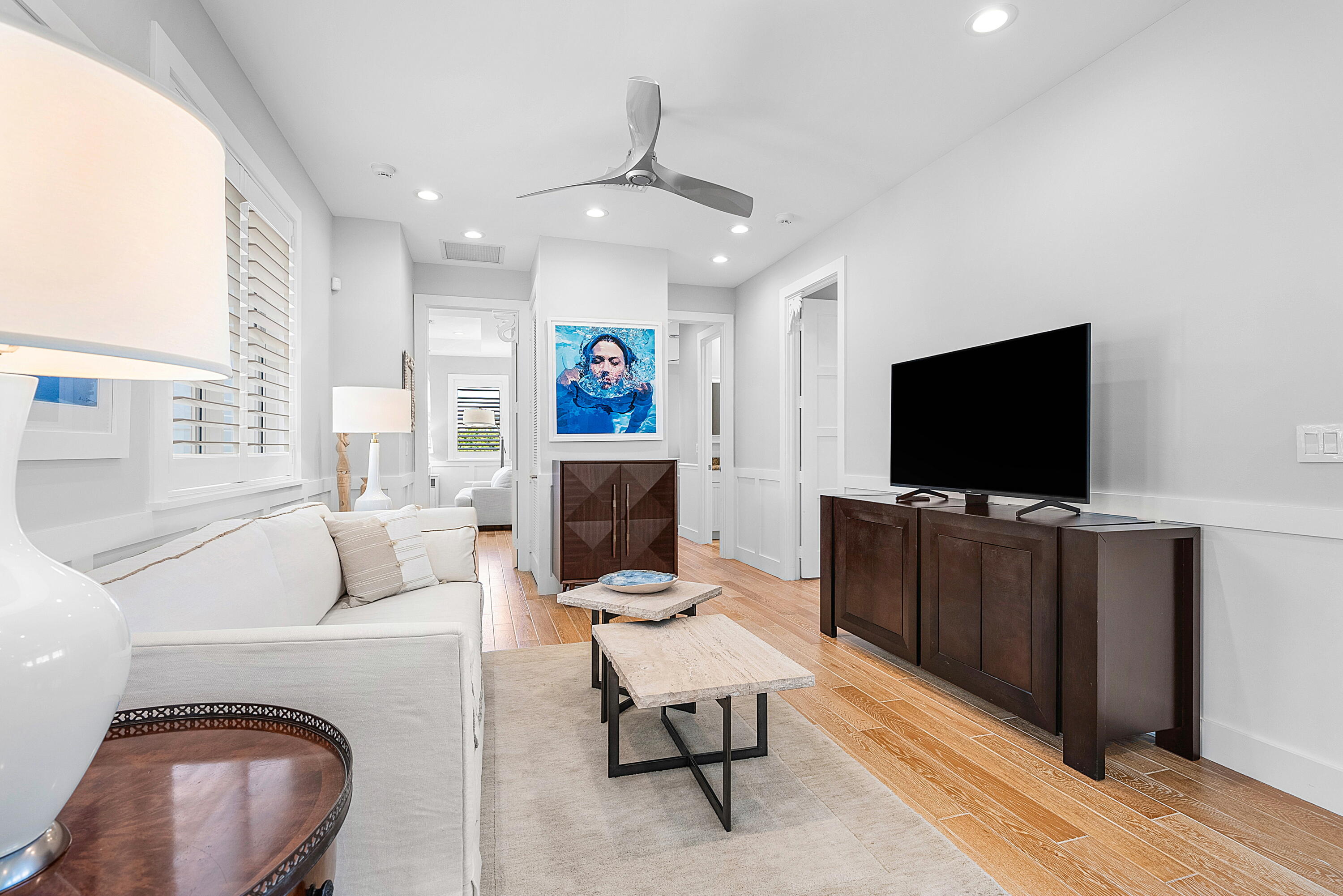 540 Northeast Spanish Trail Boca Raton, FL 33432 - Photo 22 of 47 a living room with furniture and a flat screen tv