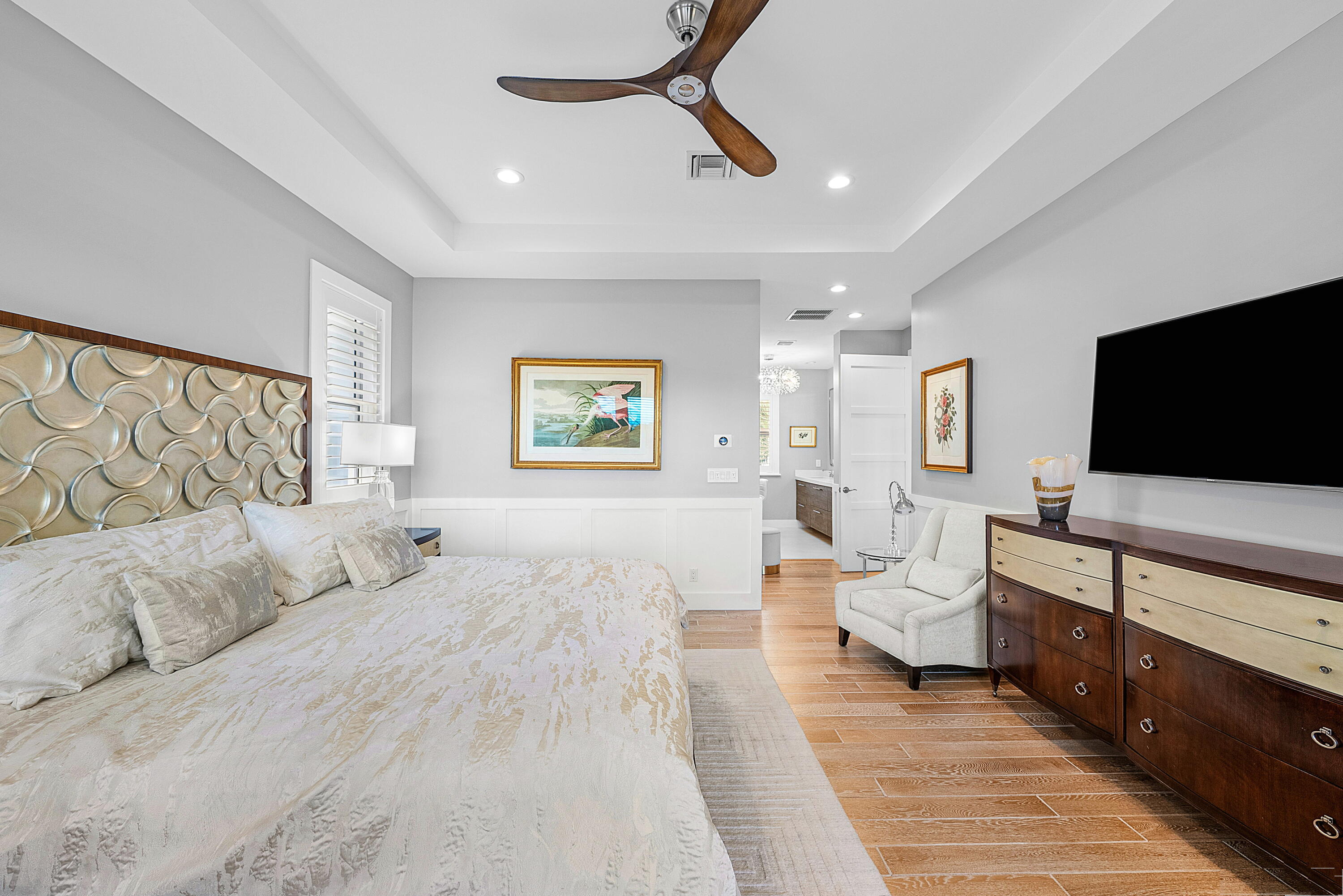 540 Northeast Spanish Trail Boca Raton, FL 33432 - Photo 25 of 47 a bedroom with a bed and a flat screen tv