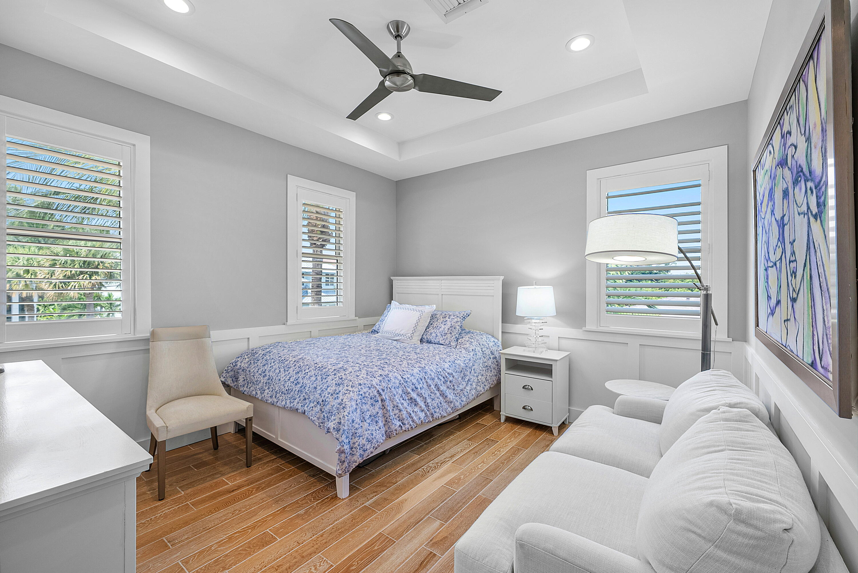 540 Northeast Spanish Trail Boca Raton, FL 33432 - Photo 29 of 47 a living room with a bed furniture and a window