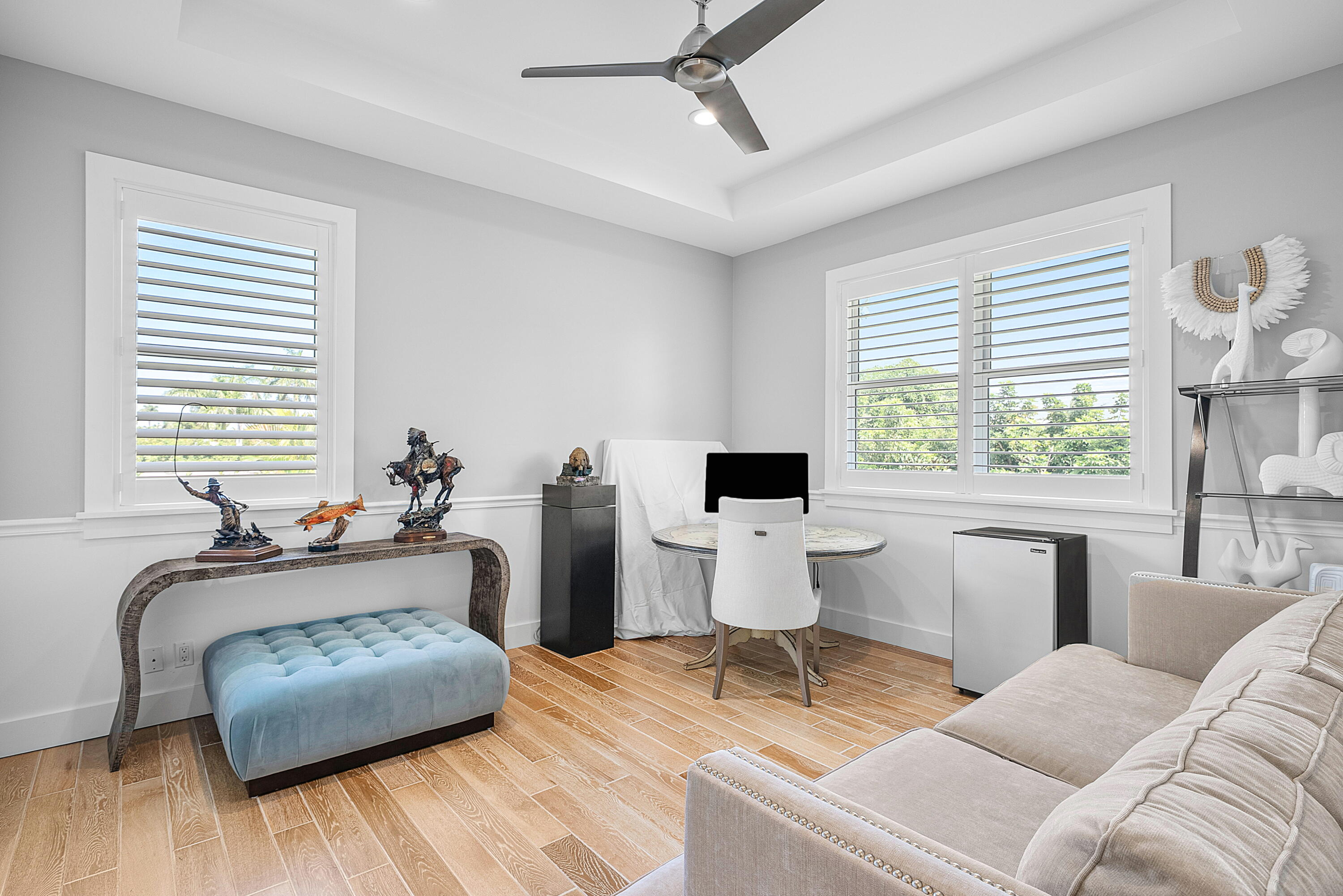 540 Northeast Spanish Trail Boca Raton, FL 33432 - Photo 31 of 47 a living room with furniture a window and a table