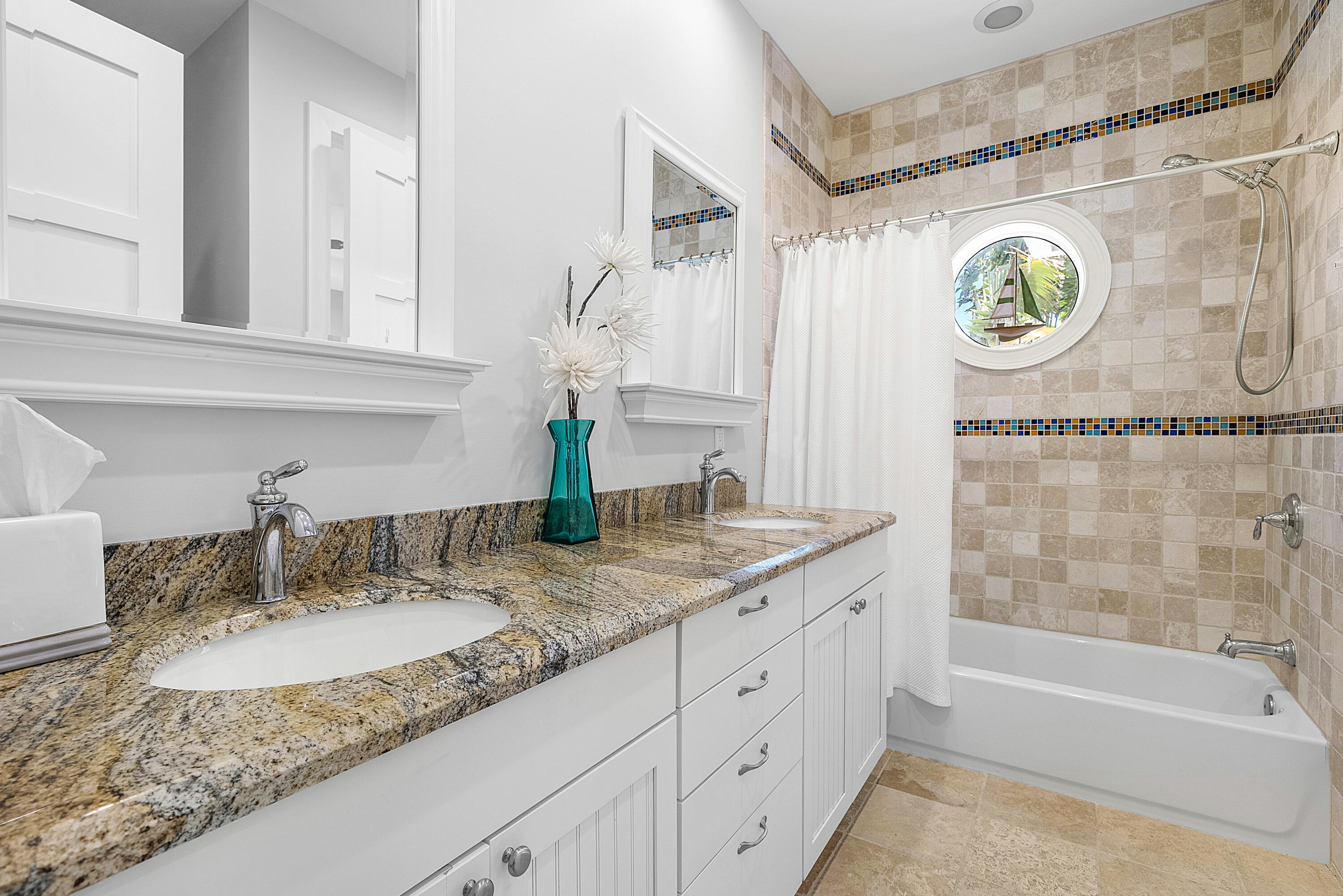 540 Northeast Spanish Trail Boca Raton, FL 33432 - Photo 33 of 47 a bathroom with a granite countertop sink and a mirror