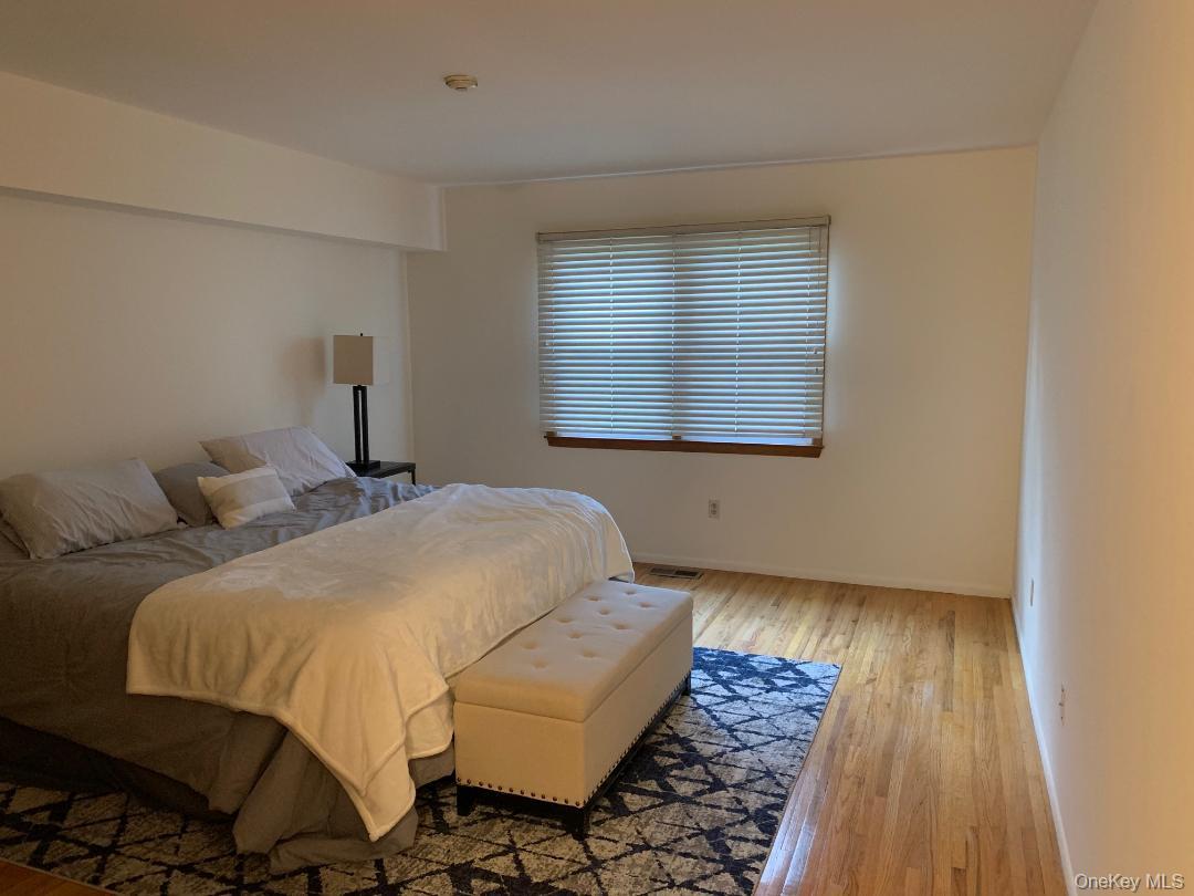 135 West Nyack Road, Unit 51 Nanuet, NY 10954 - Photo 10 of 16 Bedroom with hardwood /