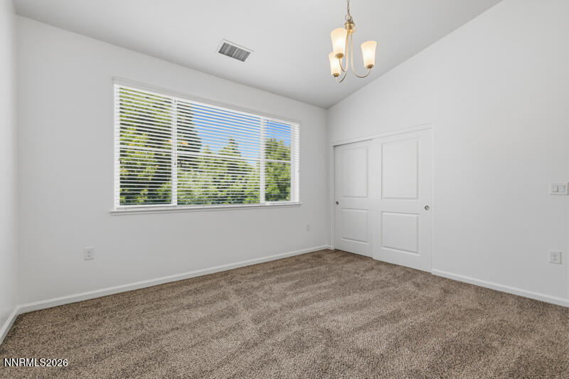 285 Mark Jeffrey Lane Reno, NV 89503 - Photo 14 of 20 a view of an empty room with a window