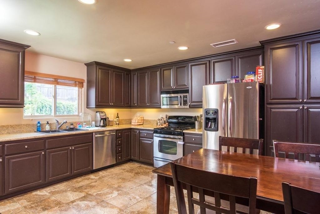 321 Womack Lane Fallbrook, CA 92028 - Photo 3 of 25 Very upgraded kitchen! Open, bright. Beautiful tile.