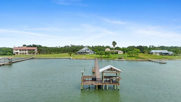 a view of a lake with a deck