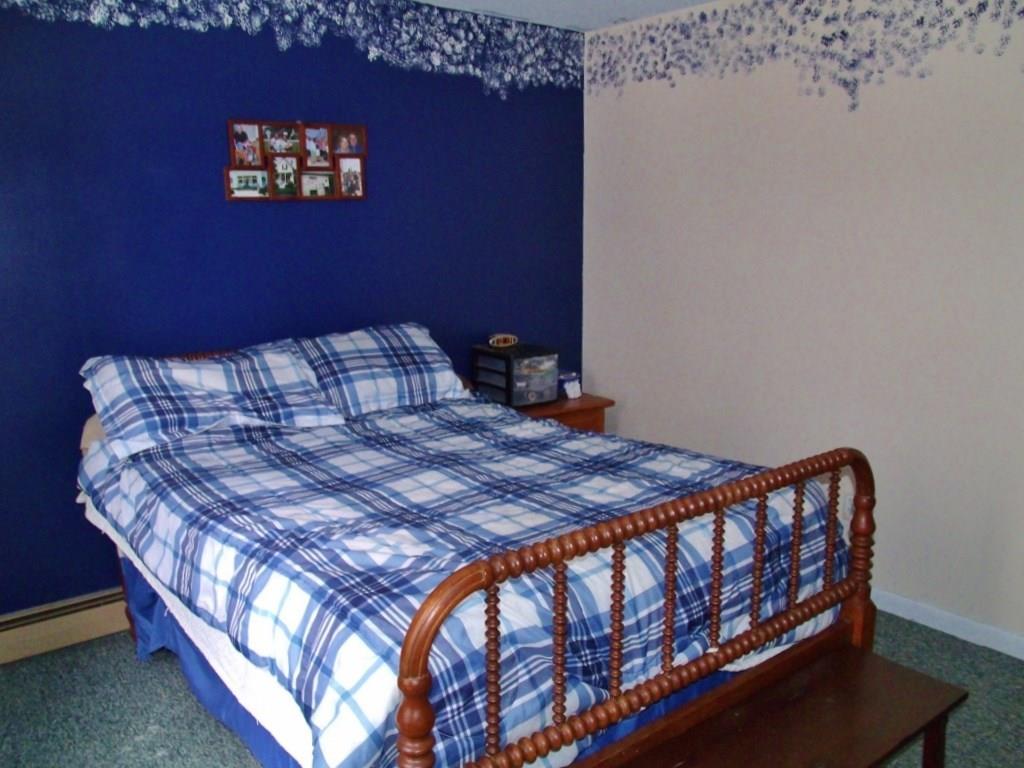 274 Red Schoolhouse Road Farmington, ME 04938 - Photo 12 of 26 Large bedroom acroos the hall from...