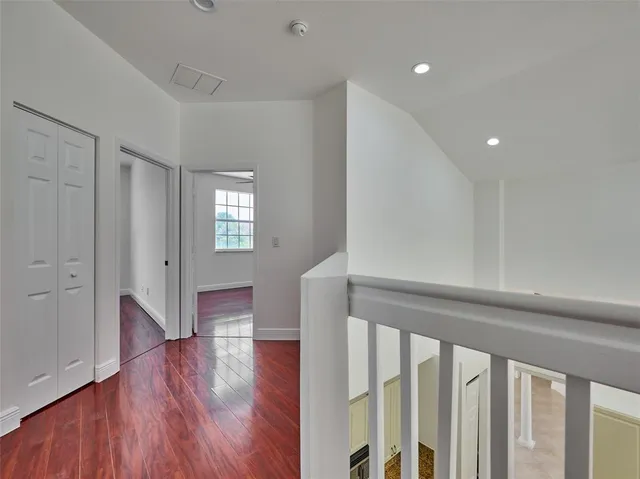 a bathroom with a sink a mirror a bathtub and shower