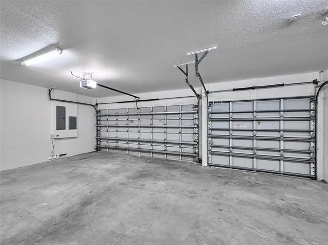 a front view of a house with a yard and street