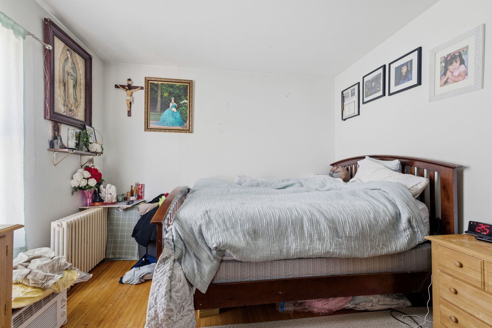 1709 South State Street Lockport, IL 60441 - Photo 13 of 26 a bedroom with a bed and wooden floor