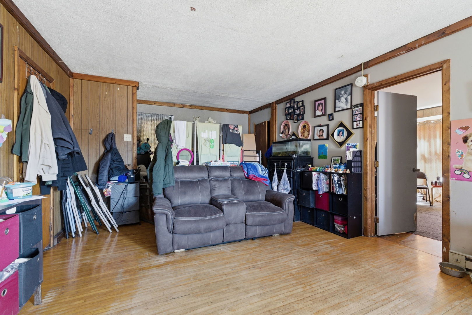 1709 South State Street Lockport, IL 60441 - Photo 15 of 26 a living room with furniture and stairs