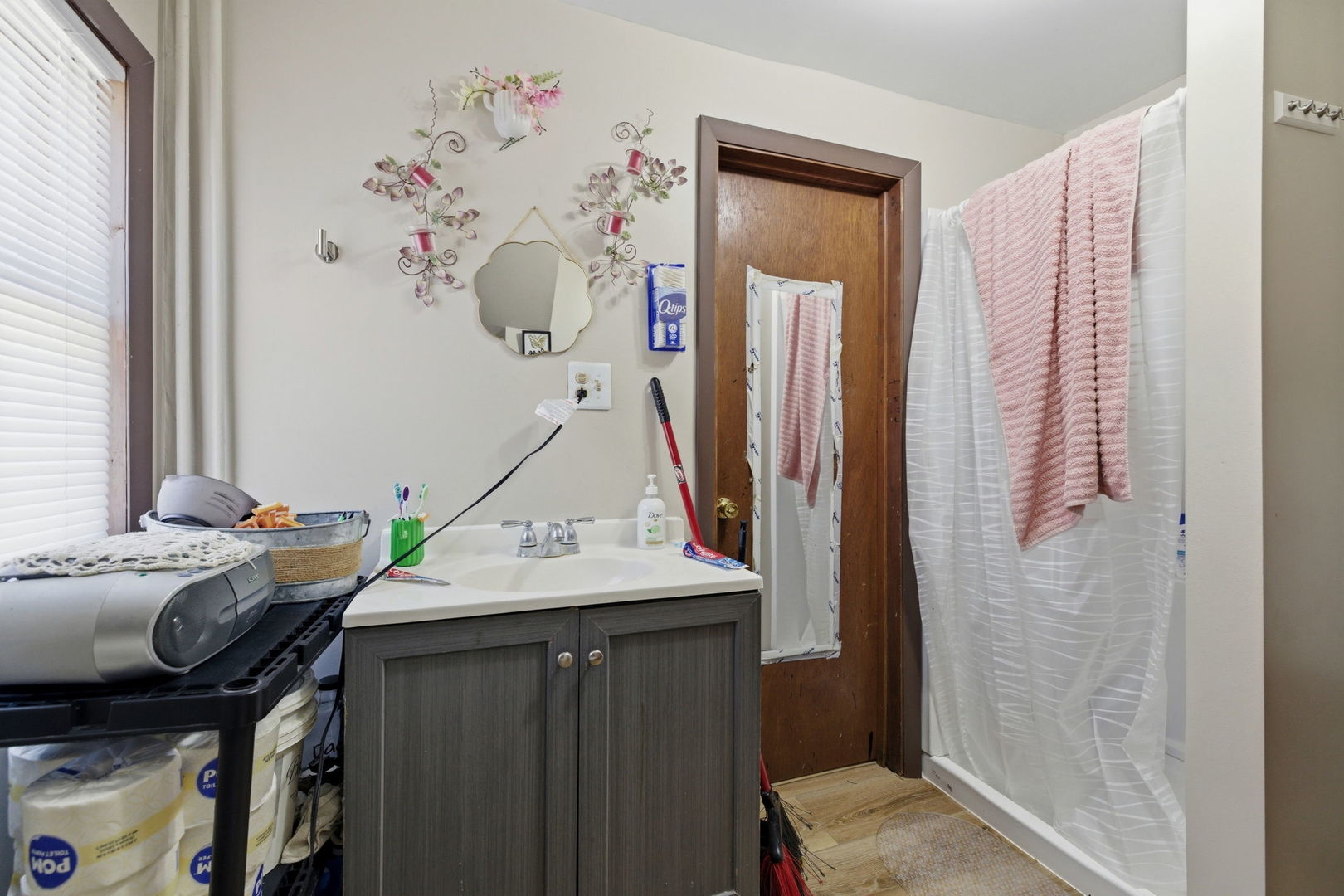 1709 South State Street Lockport, IL 60441 - Photo 17 of 26 a bedroom with a bed and a mirror