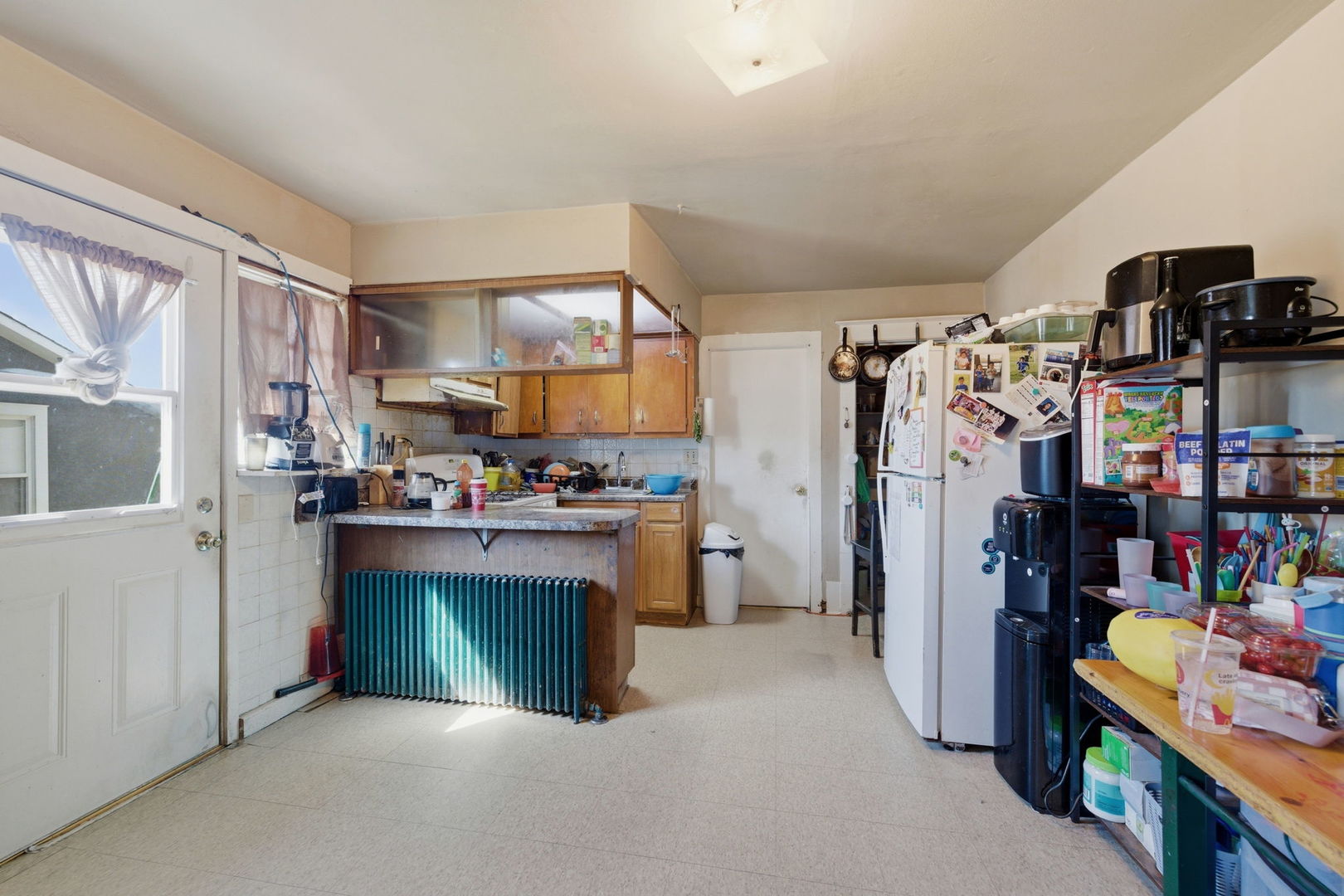 1709 South State Street Lockport, IL 60441 - Photo 18 of 26 a view of kitchen and refrigerator