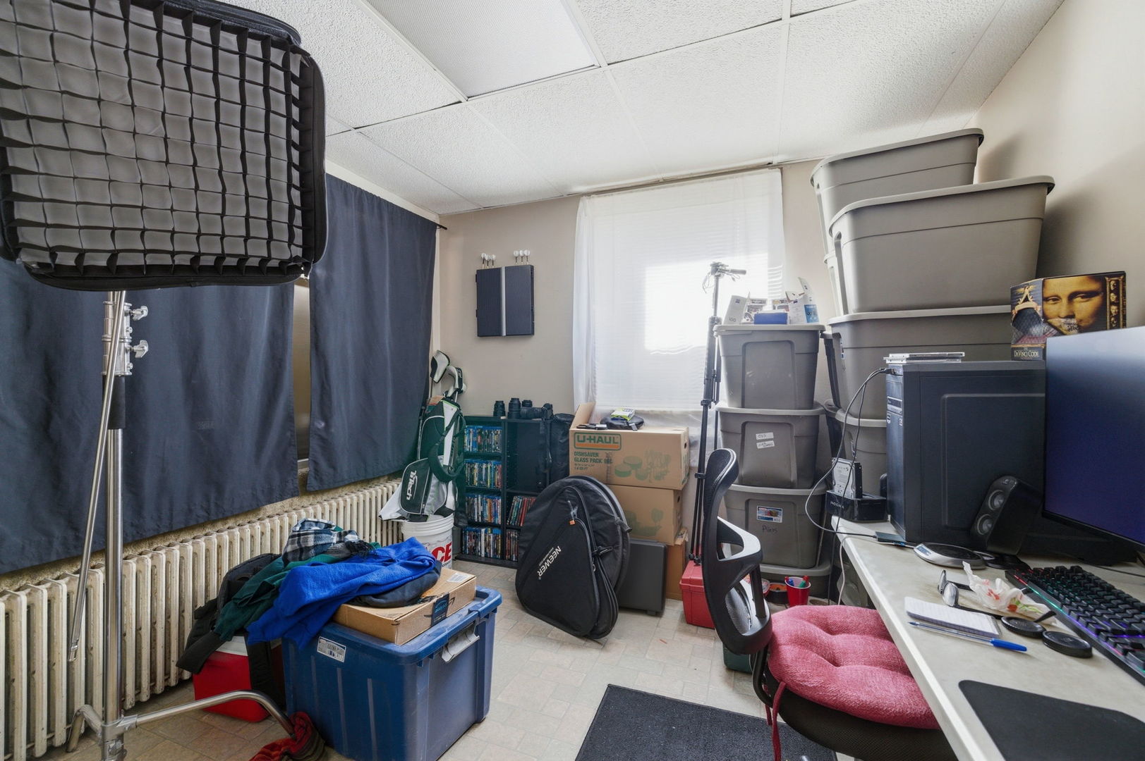 1709 South State Street Lockport, IL 60441 - Photo 20 of 26 a living room with furniture and a flat screen tv