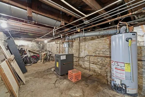 a utility room with multiple dryer and washer