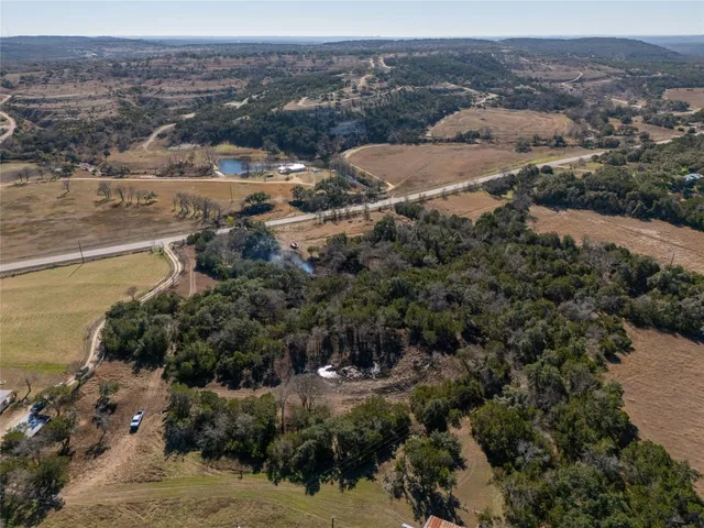 an aerial view of residential house and lake view
