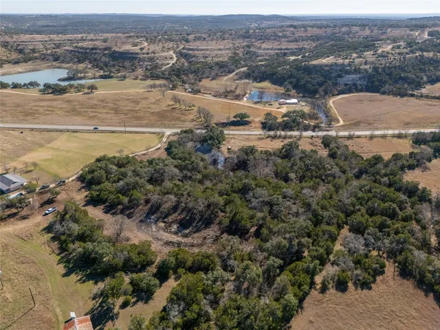 an aerial view of residential building and lake view