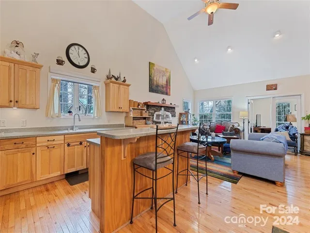 a very nice looking kitchen with a large window