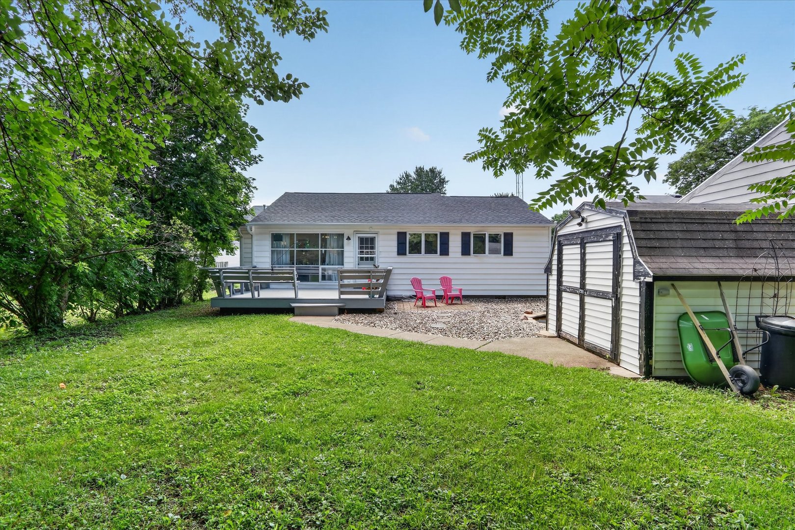 1204 West Violet Street Freeport, IL 61032 - Photo 31 of 36 a view of a house with backyard and a tree