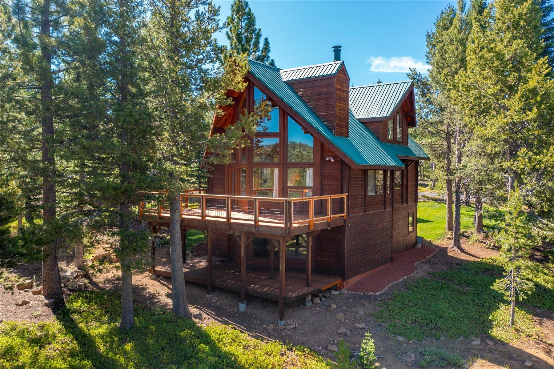 15009 Ski Slope Way Truckee, CA 96161 - Photo 20 of 28 a view of an house with backyard space and deck