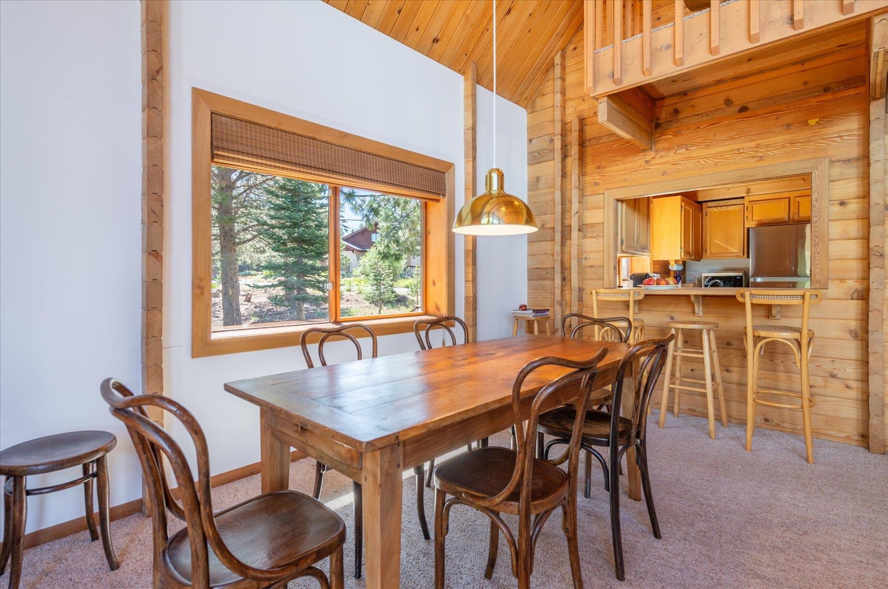15009 Ski Slope Way Truckee, CA 96161 - Photo 8 of 28 a view of a dining room with furniture and a window
