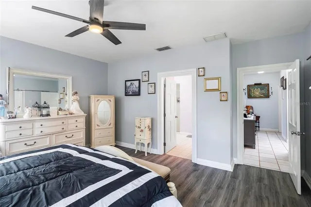 a bed room with a bed and a couch