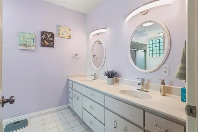 a view of a house with a backyard and a swimming pool