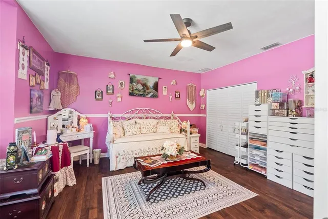 an aerial view of a house with garden space and street view