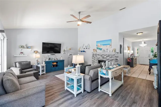 a living room with furniture or couch and a fireplace