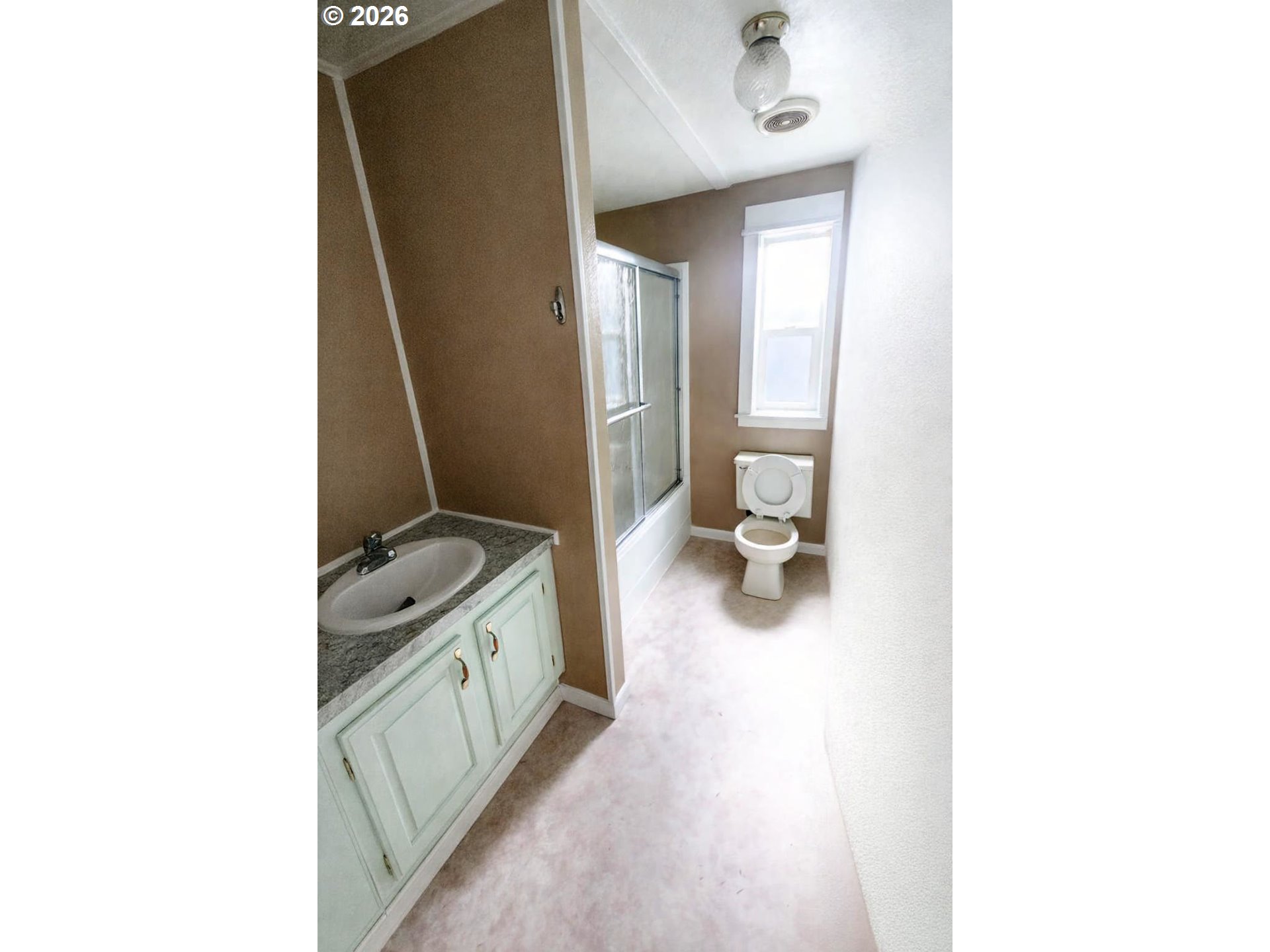 85106 Territorial Highway Eugene, OR 97402 - Photo 11 of 48 a bathroom with a sink and a toilet