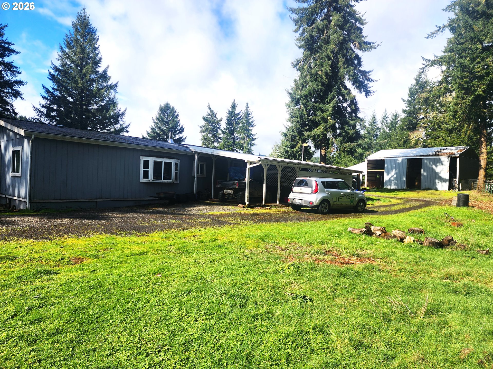 85106 Territorial Highway Eugene, OR 97402 - Photo 4 of 48 a view of a house with a yard