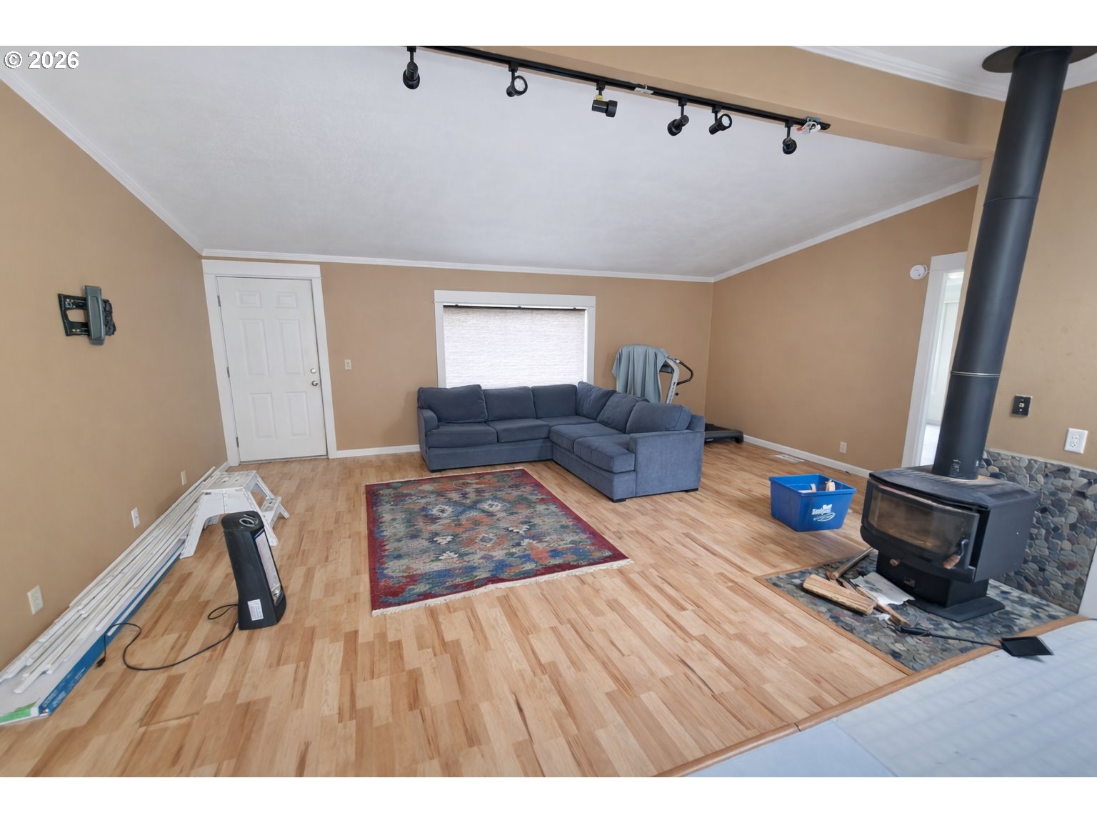 85106 Territorial Highway Eugene, OR 97402 - Photo 6 of 48 a living room with furniture and a flat screen tv